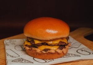 delicious burger on a wooden surface