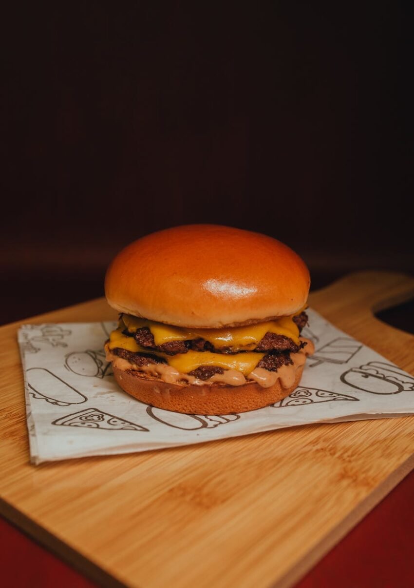 delicious burger on a wooden surface